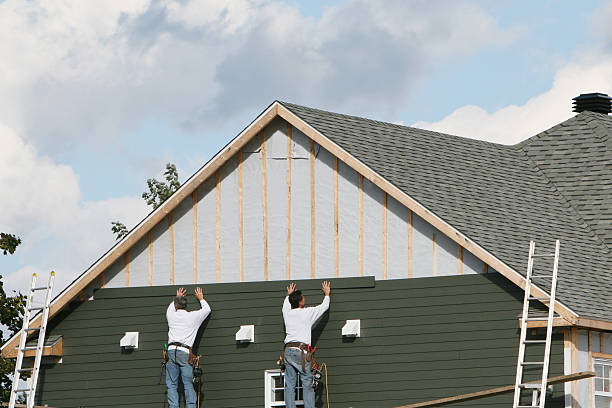 Professional Siding Replacement technician working in Mathews, VA